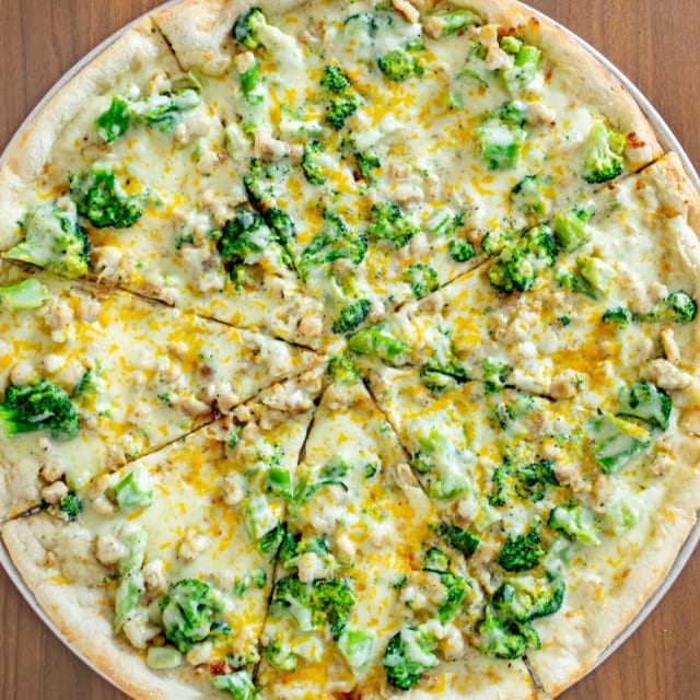 Chicken Alfredo Sauce with Broccoli Pizza.